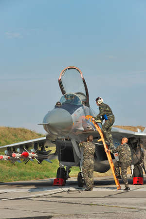 Vasilkov, Ukraine - August 3, 2012: Ukrainian Air Force MiG-29 being prepared for a training flightのeditorial素材