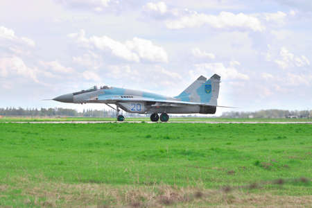 Vasilkov, Ukraine - April 24, 2012: Ukrainian Air Force MiG-29 during training flightsのeditorial素材