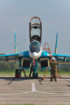 Vasilkov, Ukraine - August 3, 2012: Ukrainian Air Force MiG-29 being prepared for a training flightのeditorial素材