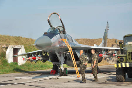 Vasilkov, Ukraine - August 3, 2012: Ukrainian Air Force MiG-29 being prepared for a training flightのeditorial素材