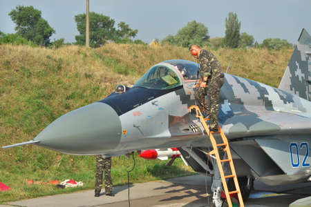 Vasilkov, Ukraine - August 3, 2012: Ukrainian Air Force MiG-29 being prepared for a training flightのeditorial素材