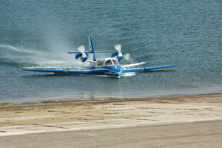 Gelendzhik, Russia - September 8, 2010: Beriev Be-103 sea plane taxiing out of the water to apron