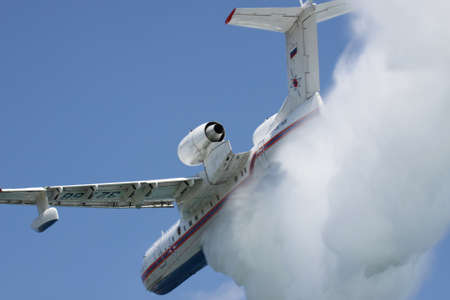 Gelendzhik, Russia - September 9, 2010: Beriev Be200 multipurpose amphibian plane showing its firefighting water dropping abilitiesのeditorial素材