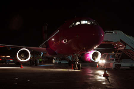 Kiev, Ukraine - March 27, 2011: Wizz Air Airbus A320 plane waiting for the passengers at the airport...