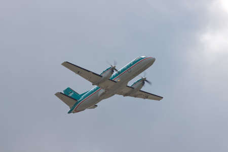 Borispol, Ukraine - October 2, 2010: Saab 340A regional plane is taking after the rainのeditorial素材