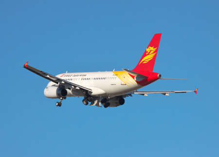 Simferopol, Ukraine - September 12, 2010: Capital Airlines Airbus A319 is taking off from the airport and retracting ist gearのeditorial素材