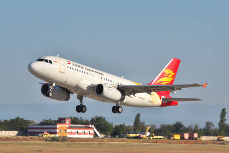 Simferopol, Ukraine - September 12, 2010: Capital Airlines Airbus A319 is taking off from the airport in the eveningのeditorial素材