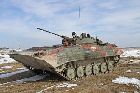 Zhitomir, Ukraine - March 10, 2011: Armored personnel carrier BMP-2 during the military trainings in the fieldのeditorial素材