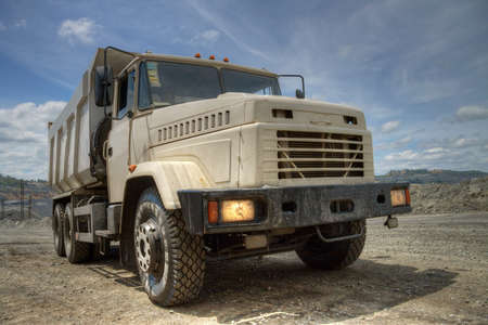Poltava Region, Ukraine - June 26, 2010: Dump truck with headlights on waiting for loading on the iron ore opencastのeditorial素材