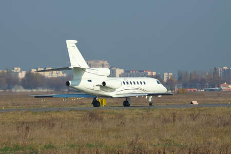 Private business jet plane is taking off from the airport