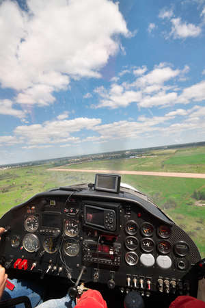 View from the cockpit of a small plane on final landing
