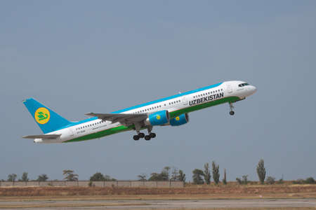 Simferopol, Ukraine - September 13, 2010: Uzbekistan Airways Bowing 757-200 is taking off from the runwayのeditorial素材