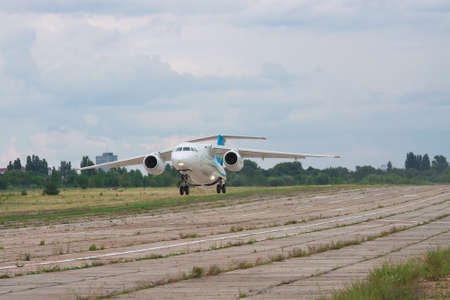 Kiev, Ukraine - August 3, 2011: Antonov An-148 regional passenger jet plane is taking off from the manufacturer's runwayのeditorial素材
