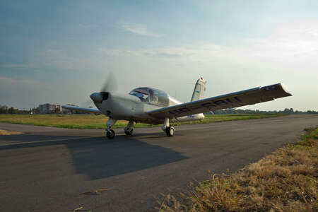 Kiev, Ukraine - September 26, 2014: Socata Rallye 150TD light private plane taxiing after landing in the airportのeditorial素材