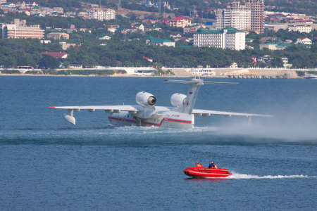 Gelendzhik, Russia - September 8, 2010: Beriev Be-200 amphibian plane is preparing for a takeoff from water surfaceのeditorial素材