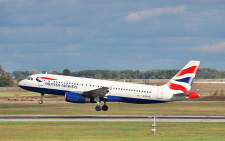 Kiev Region, Ukraine - October 2, 2011: British Airways Airbus A320 is landing on the runwayのeditorial素材