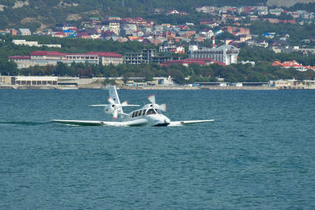 Gelendzhik, Russia - September 8, 2010: Beriev Be-103 amphibious plane taxiing after landing on the...