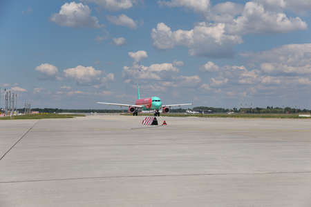 Borispol, Ukraine - July 5, 2014: WINDROSE Airbus A321 is taxiing along the airfield to the runway for takeoffのeditorial素材