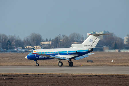 Kiev, Ukraine - March 15, 2011: Yakovlev Yak-40 regional passenger jet plane takeoffのeditorial素材