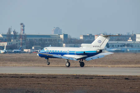 Kiev, Ukraine - March 15, 2011: Yakovlev Yak-40 regional passenger jet plane taking offのeditorial素材
