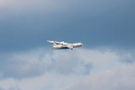 Gelendzhik, Russia - September 8, 2010: Beriev Be-200 plane in flight against blue sky on the backgroundのeditorial素材