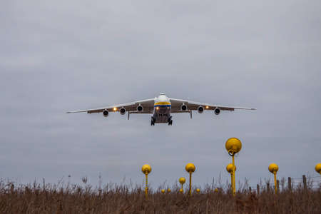 Kiev Region, Ukraine - January 8, 2012: Antonov An-225 Mriya cargo plane is on finallanding at duskのeditorial素材