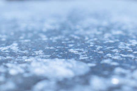 Fresh ice on the river covered with some snowの写真素材