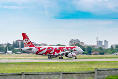 Kyiv, Ukraine - June 09, 2019: Ernest Airbus A320 on the runway in Kyiv Sikorsky Airportのeditorial素材