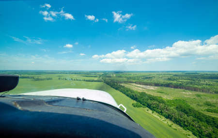 View from the cockpit of a light plane while approaching the runway during the landing