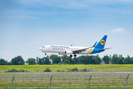 Boryspil, Ukraine - August 3, 2019: Ukraine International Airlines Boeing 737 is langing in the airportのeditorial素材
