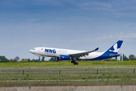 Boryspil, Ukraine - August 3, 2019: MNG Gargo Airlines Airbus A330 is langing in the airportのeditorial素材