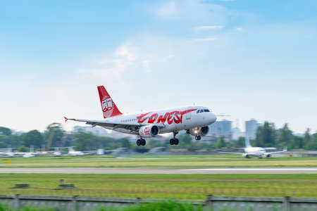 Kyiv, Ukraine - June 9, 2019: Ernest Airbus A320 is landing in the airportのeditorial素材