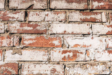 Brick wall texture background with strong contrastの写真素材