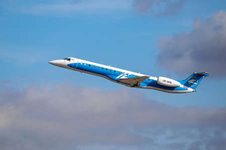 Kyiv Region, Ukraine - October 1, 2019: Dniproavia Embraer ERJ-145 Regional Jet is taking off into flightのeditorial素材