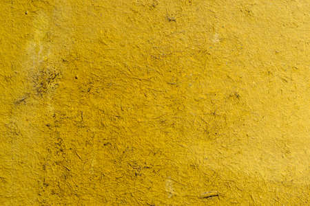 Scratched surface background in yellow