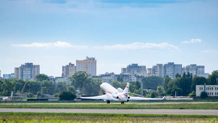 Business jet is taking off from the runwayの写真素材