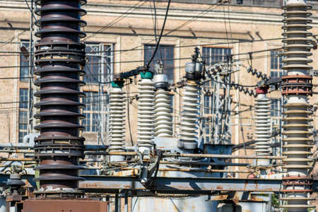 Electric power plant closeup with large insulators viewの写真素材