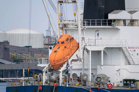 Lifeboat survival capsule on the cargo ship