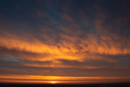 Dramatic apocalyptic sky  background summer sunriseの写真素材