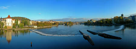 Panoramatic photo of the city of Prague with a view at Vltava River and Castleの写真素材