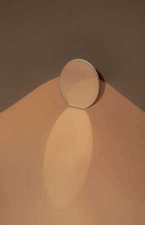 Minimal abstract mirror reflection two color background. Trendy soft colors. Product placement spot. Copy space.の写真素材