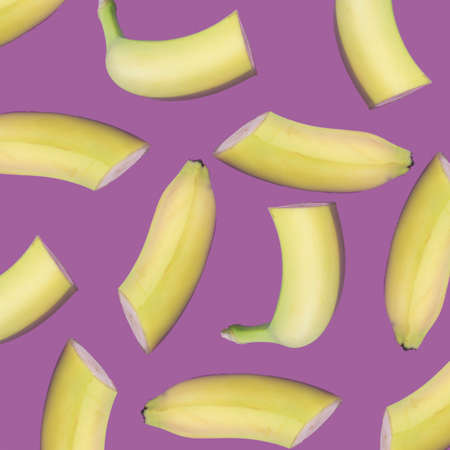 Banana slices on trendy pastel pink background. Randomly multiplied illustration. Minimal abstract summer concept.の写真素材