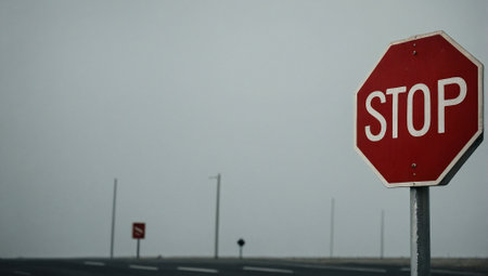 Red stop sign on neutral background.  Minimal abstract warning and forbidden actions concept. With copy space.の素材