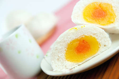 steamed pork buns, chinese dim sum on the bamboo and teacupの写真素材