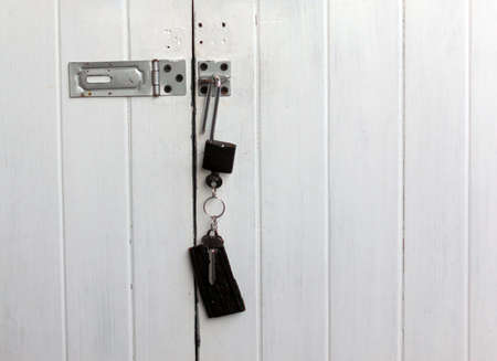 unlock   key to success   open white wood door