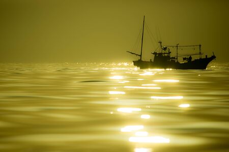 Fishing Boats and Sunrise