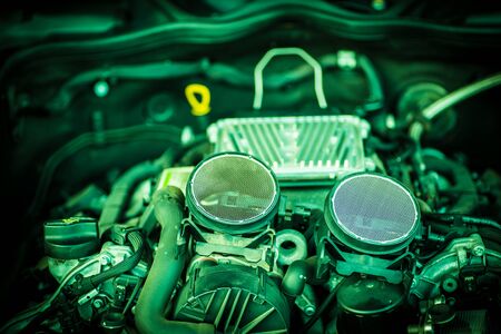 Mechanic performing car maintenance in garage