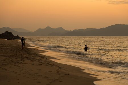 Japan sunset sea and sandy beachの写真素材