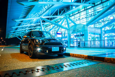 Night view of BMW MINI and airport on international flightsのeditorial素材