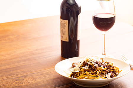 Meat sauce spaghetti with red wineの写真素材